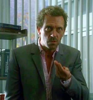 Hugh Laurie of House, poppin pills